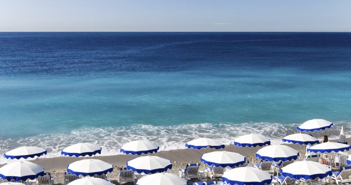 Beautiful Nice beach with umbrellas